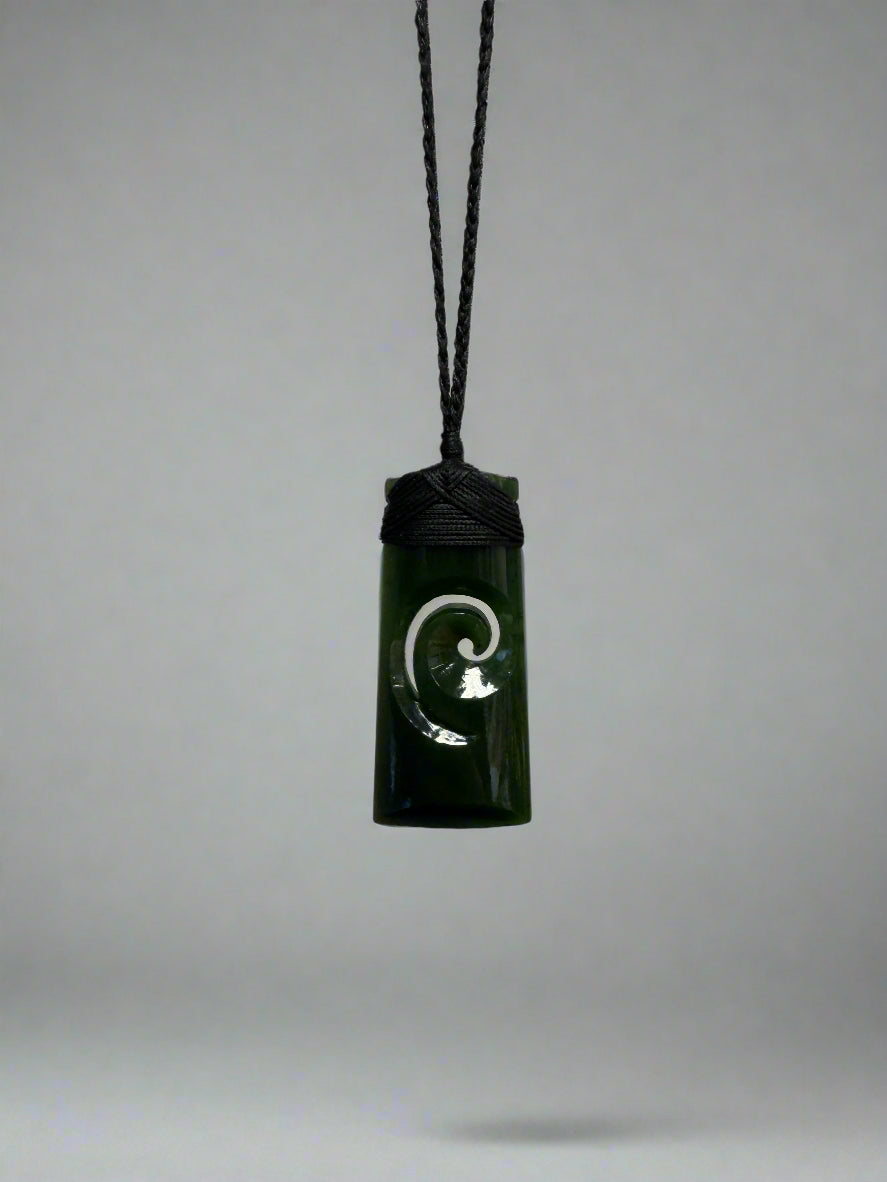 Jade Toki with Koru