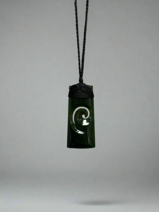 Jade Toki with Koru
